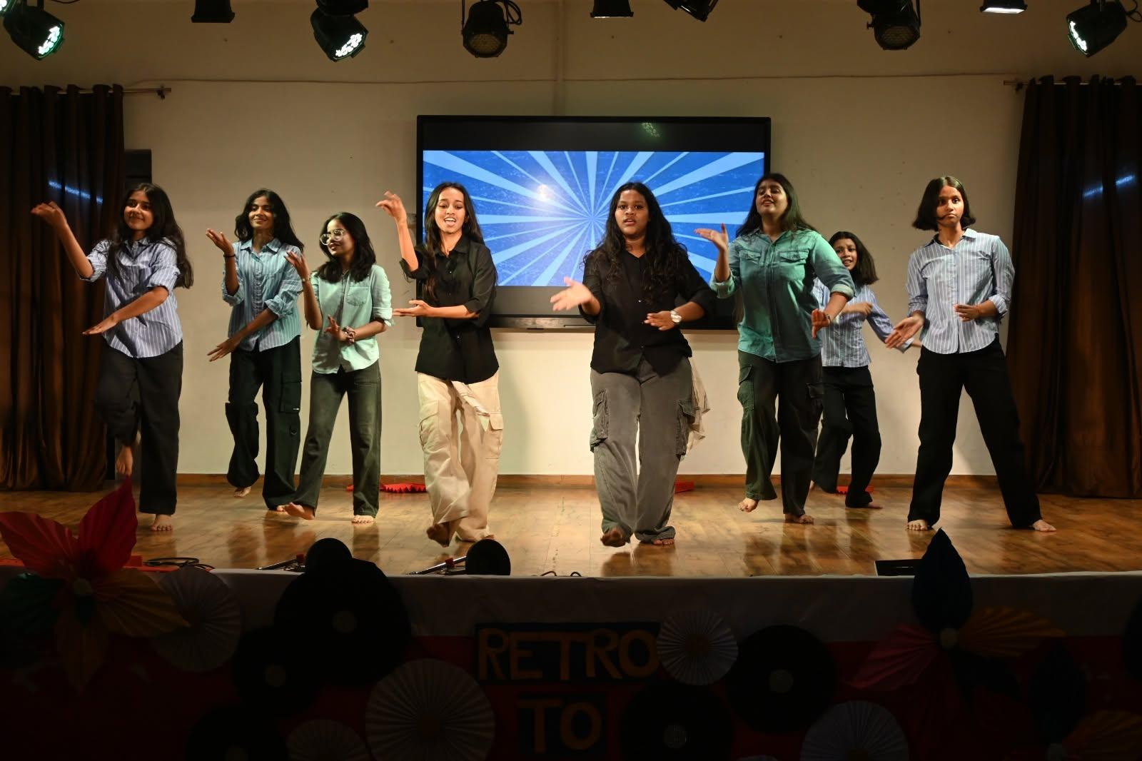 Students performing on stage at the Children's Day celebration